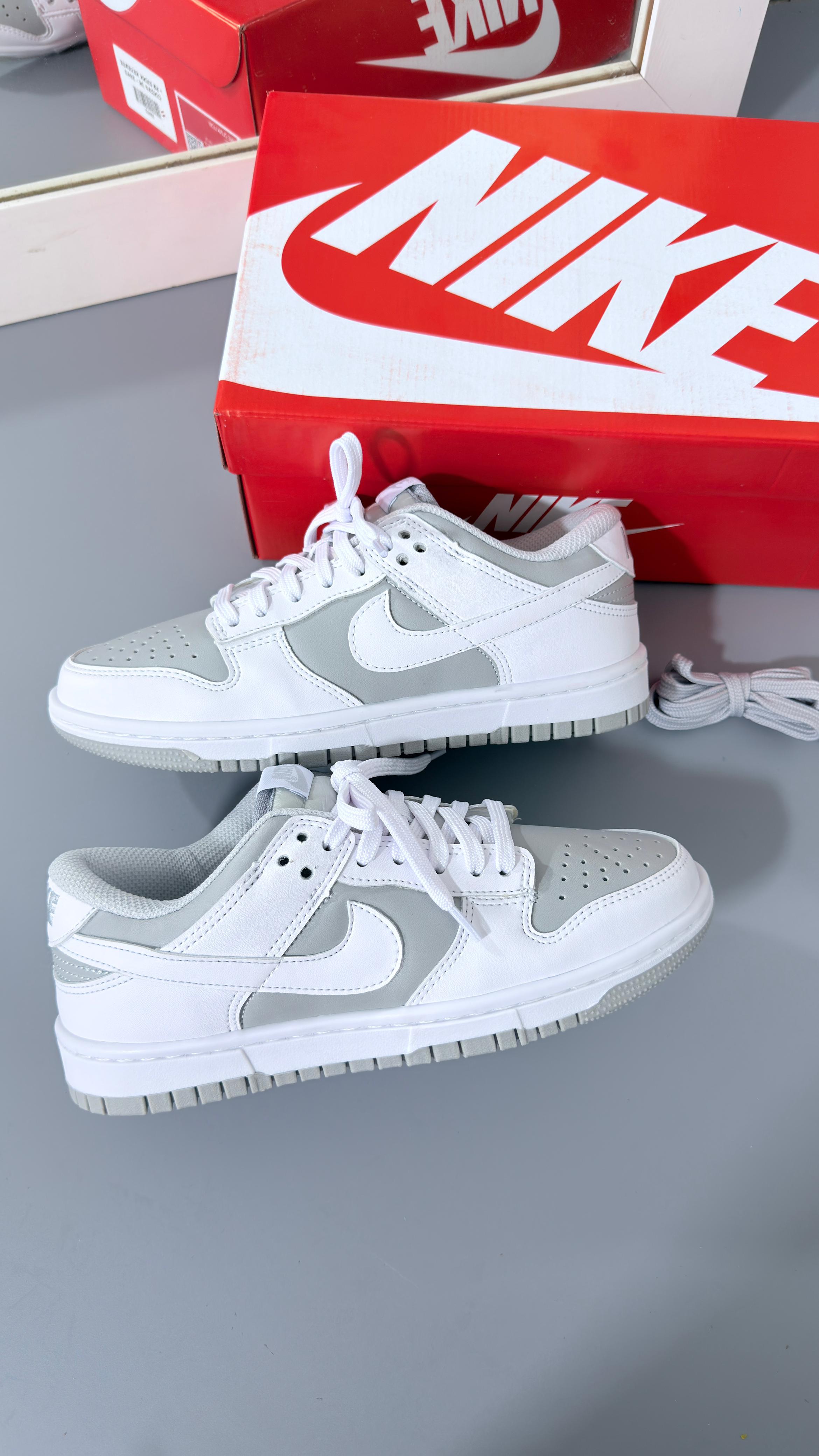Nike SB Dunk Low - Cinza/Reverse